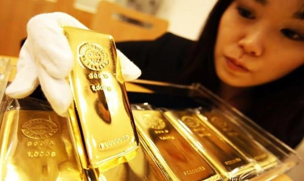 Giá vàng thế giới áp sát mức “đỉnh” trong ba tháng qua ảnh 1