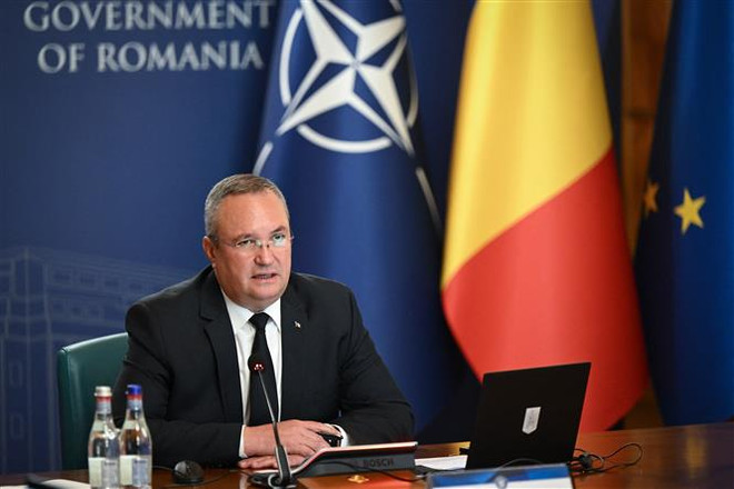 Thủ tướng Romania Nicolae Ciuca tuyên bố mãn nhiệm trong bài phát biểu tại Cung điện Victoria ở Bucharest ngày 12/6/2023. (Ảnh: AFP/TTXVN) Tổng thống Romania bổ nhiệm ông Catalin Predoiu làm Thủ tướng lâm thời ảnh 1