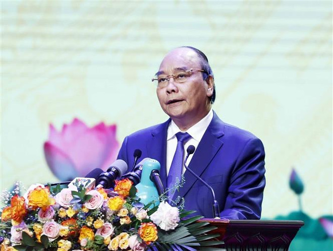 Chủ tịch nước Nguyễn Xuân Phúc phát biểu. (Ảnh: Thống Nhất/TTXVN) "Mãi mãi biết ơn những người mang lại độc lập, hòa bình cho Tổ quốc" ảnh 1