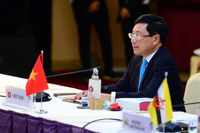 Phó Thủ tướng, Bộ trưởng Ngoại giao Phạm Bình Minh tham dự Hội nghị. (Ảnh: Ngọc Quang-Hữu KiênTTXVN) Khai mạc Hội nghị Bộ trưởng Ngoại giao ASEAN lần thứ 52 ảnh 2