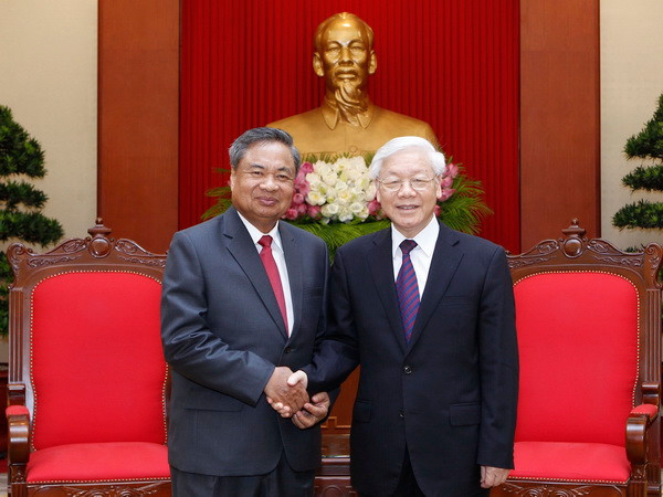 Tổng Bí thư tiếp Đoàn Ban Tổ chức Trung ương Đảng NDCM Lào ảnh 1