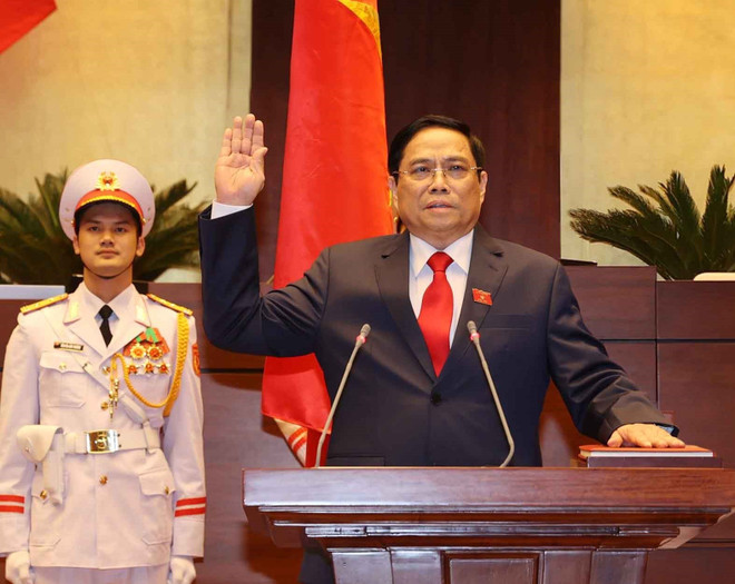Thủ tướng Phạm Minh Chính tuyên thệ nhậm chức trước Quốc hội, đồng bào và cử tri cả nước. (Ảnh: Thống Nhất/TTXVN) Tiểu sử tóm tắt của tân Thủ tướng Chính phủ Phạm Minh Chính ảnh 1