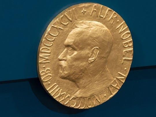 Nobel 2019: Hồi hộp chờ các chủ nhân giải thưởng lộ diện ảnh 1