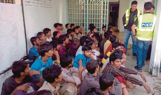 Malaysia cứu 46 người nước ngoài khỏi đường dây buôn người ảnh 1