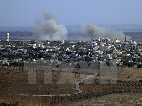 Syria: Xe cứu trợ được phép vào cả vùng quân chính phủ và phiến quân ảnh 1