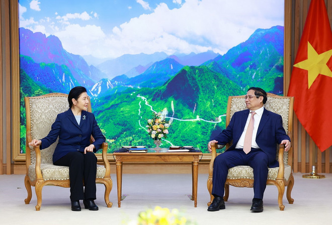 Thủ tướng Phạm Minh Chính tiếp Bộ trưởng Tư pháp Trung Quốc Hạ Vinh. (Ảnh: Dương Giang/TTXVN) ttxvn_pham minh chinh ha vinh_1.jpg