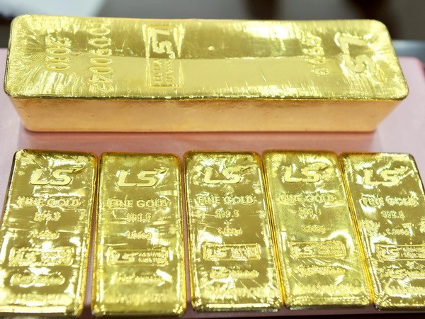 Vàng mất giá hai phiên liên tiếp sau đánh giá của Fed ảnh 1