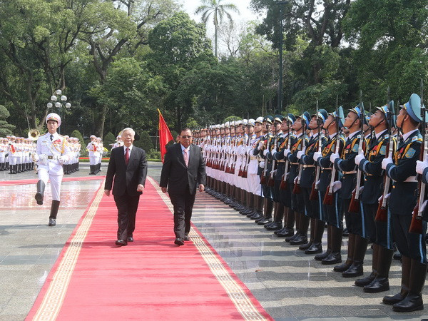 Tổng Bí thư đón và hội đàm với Tổng Bí thư, Chủ tịch nước Lào ảnh 1