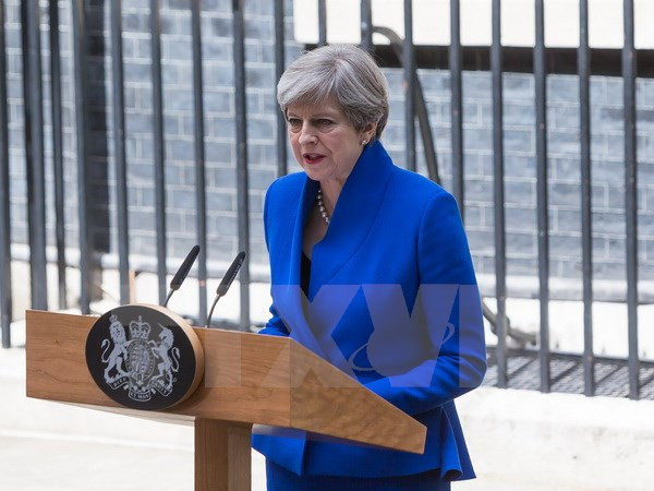Thủ tướng Anh Theresa May. (Nguồn: THX/TTXVN) Tương lai bất định của nước Anh sau hàng loạt sự kiện chấn động ảnh 1