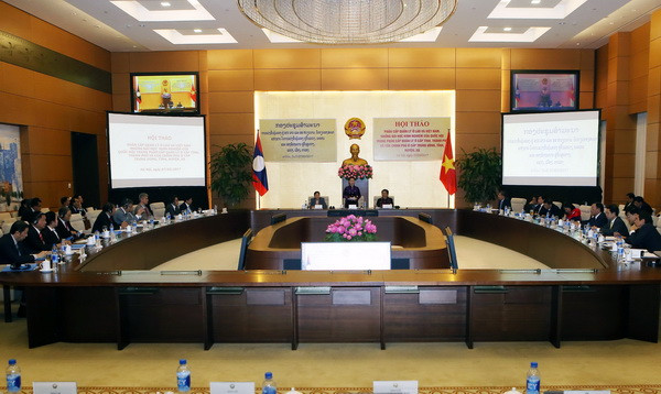 Việt Nam-Lào chia sẻ kinh nghiệm về phân cấp quản lý ảnh 1