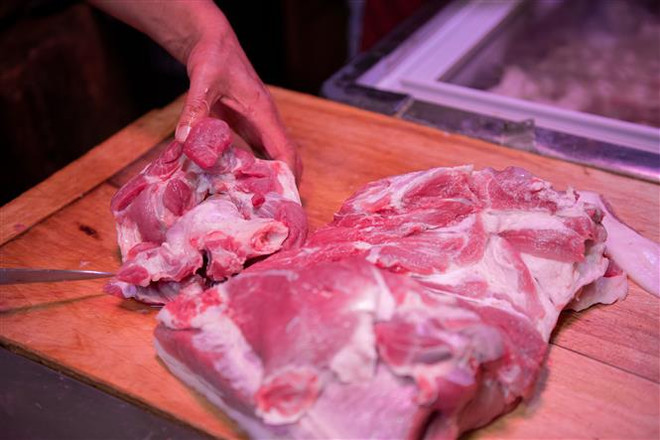 Giá thịt lợn tăng vọt, Trung Quốc cân nhắc xả kho dự trữ chiến lược ảnh 1