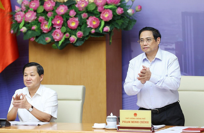 Thủ tướng Phạm Minh Chính và Phó Thủ tướng Lê Minh Khái chủ trì hội nghị phát triển thị trường bất động sản an toàn, lành mạnh, bền vững. (Ảnh: Dương Giang/TTXVN) Thủ tướng chủ trì hội nghị về phát triển thị trường bất động sản ảnh 1