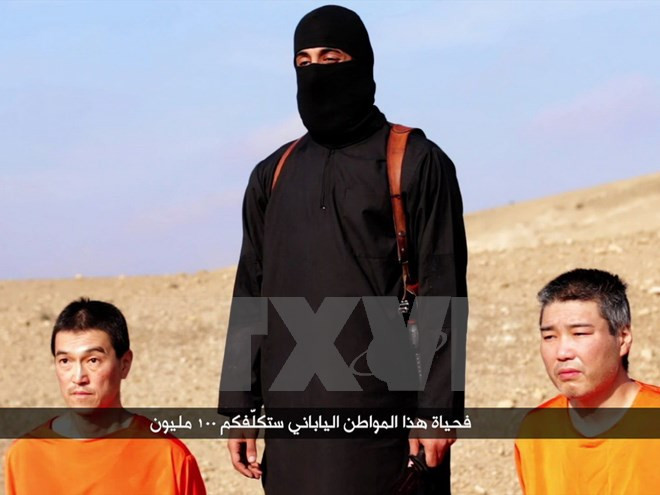 Nhật Bản quyết không từ bỏ nỗ lực giải cứu con tin bị IS bắt giữ ảnh 1