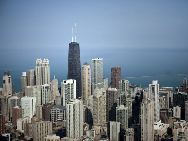 Fed: Kinh tế Mỹ tiếp tục tăng trưởng ở mức khiêm tốn ảnh 1