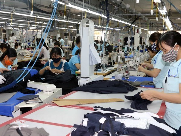 Dây chuyền may xuất khẩu. Ảnh minh họa. (Nguồn: TTXVN) Hoa Kỳ muốn trở thành đối tác quan trọng của Việt Nam ảnh 1