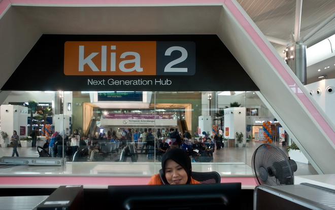 Malaysia bắt hơn 10 nhân viên xuất nhập cảnh câu kết với tội phạm ảnh 1