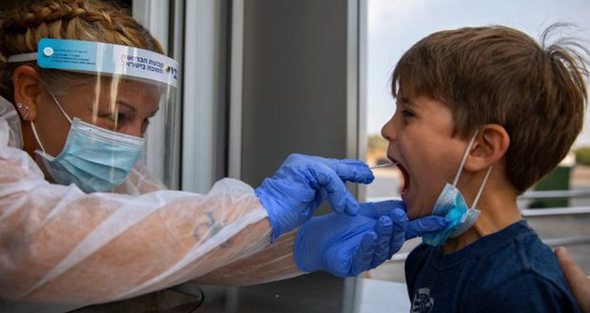 Dịch COVID-19: Israel yêu cầu xét nghiệm đối với trẻ từ 3 tuổi trở lên ảnh 1