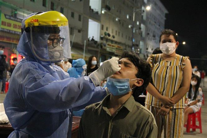 Sáng 16/7 Việt Nam ghi nhận 1.438 ca mắc mới COVID-19 trong nước ảnh 1