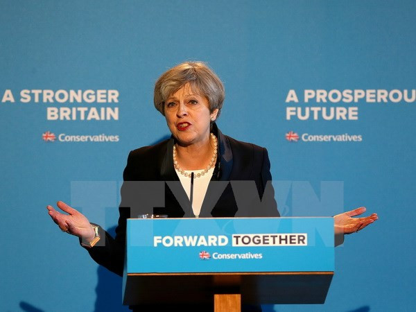 EIU: Thủ tướng Anh Theresa May đối mặt với áp lực ngày càng tăng ảnh 1