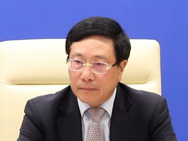 Phó Thủ tướng, Bộ trưởng Ngoại giao Phạm Bình Minh. (Ảnh: Lâm Khánh/TTXVN) Nâng cao hơn nữa công tác người Việt ở nước ngoài trong tình hình mới ảnh 1