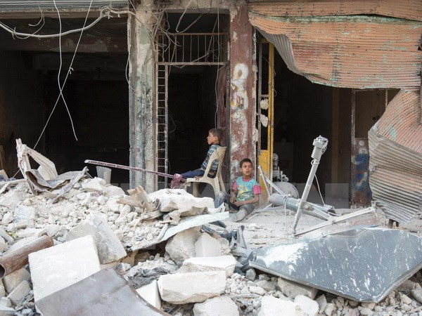 SOHR: Gần 60 dân thường thiệt mạng trong cuộc không kích ở Syria ảnh 1