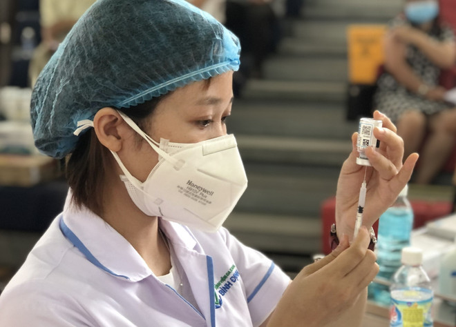 Ảnh minh họa. (Ảnh: Nguyên Linh/TTXVN) Khoảng 12 triệu liều vaccine chuyển tới các địa phương đang có dịch ảnh 1