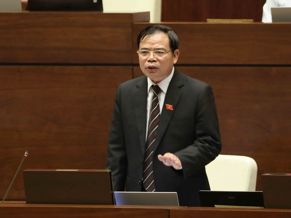 Bộ trưởng Bộ Nông nghiệp và Phát triển Nông thôn Nguyễn Xuân Cường trả lời chất vấn của Đại biểu Quốc hội. (Ảnh: Phương Hoa/TTXVN) Định hướng thị trường nông sản cần theo nhu cầu, tín hiệu thị trường ảnh 1