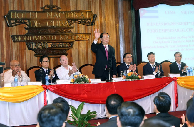 Chủ tịch nước Trần Đại Quang đến dự và phát biểu tại Diễn đàn Doanh nghiệp Việt Nam-Cuba. (Ảnh: Nhan Sáng/TTXVN) Chủ tịch nước Trần Đại Quang dự Diễn đàn doanh nghiệp Việt Nam-Cuba ảnh 1