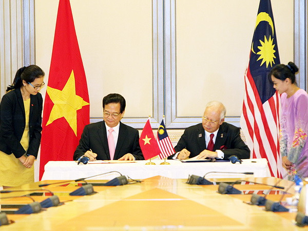 Thủ tướng kết thúc chương trình hoạt động tại Malaysia, Singapore ảnh 1