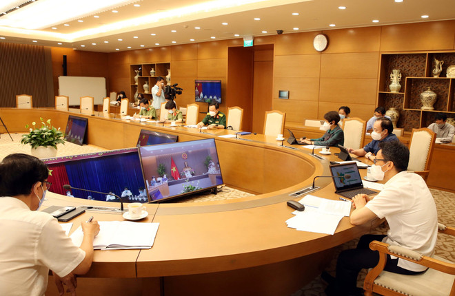 PTT Vũ Đức Đam chủ trì họp trực tuyến với Bình Dương về chống dịch ảnh 4