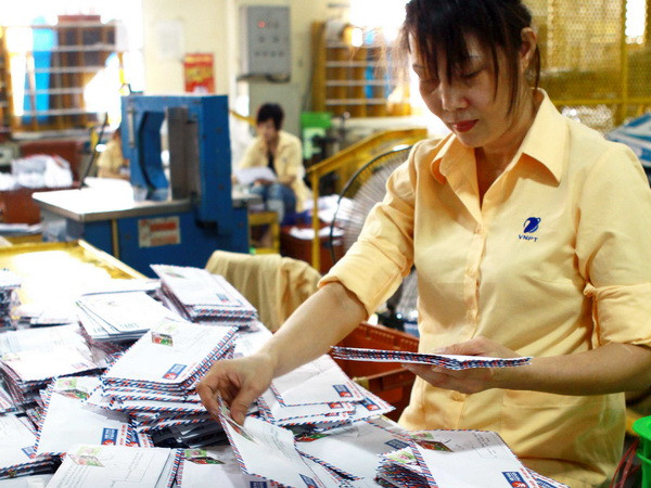 (Ảnh minh họa: Minh Tú/TTXVN) Bưu điện Việt Nam điều chỉnh giá cước dịch vụ thư cơ bản ảnh 1