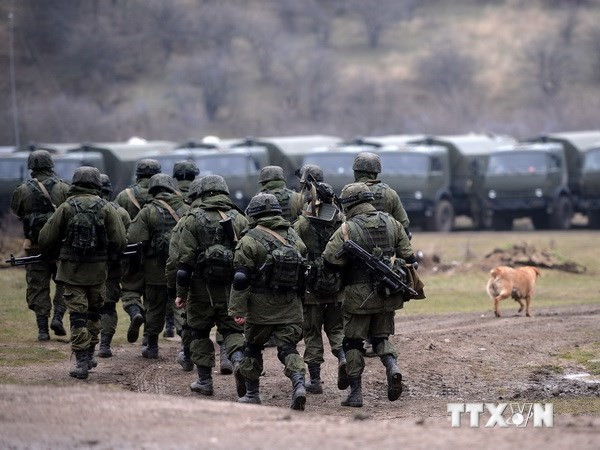 Binh sỹ Nga trở về căn cứ sau cuộc tập trận gần biên giới Ukraine ảnh 1