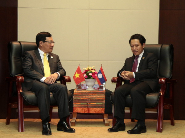 Hoạt động của Phó Thủ tướng, Bộ trưởng Ngoại giao tại Lào ảnh 1