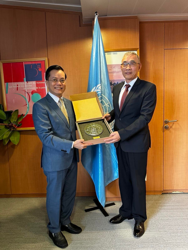 Thứ trưởng Ngoại giao Hà Kim Ngọc gặp và làm việc với Phó Tổng Giám đốc UNESCO kiêm Trợ lý Tổng Giám đốc về Quan hệ đối ngoại và Ưu tiên Châu Phi Xing Qu. (Ảnh TTXVN phát) viet_nam_tang_cuong_hop_tac_voi_unesco_va_cac_quoc_gia_thanh_vien3.jpg