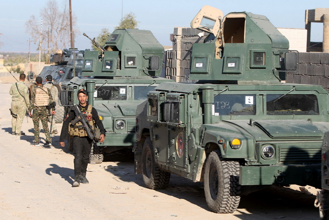 Iraq phải cắt giảm quân số lực lượng bán vũ trang vì thiếu tiền ảnh 1