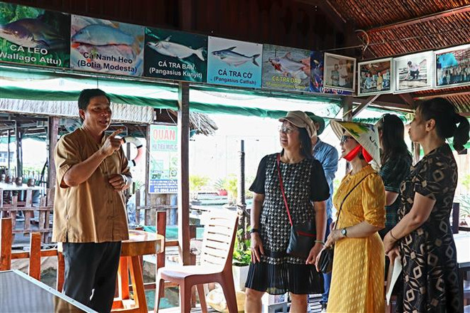 Người nông dân thành công với mô hình nông nghiệp kết hợp du lịch ảnh 2