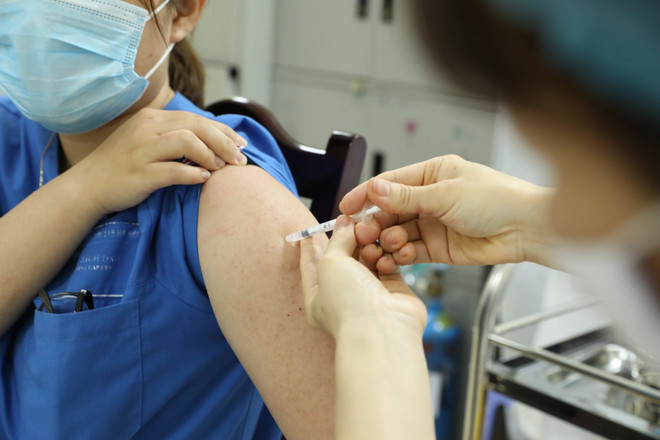 Nhìn lại cuộc chiến chống đại dịch COVID-19 của Việt Nam hơn 1 năm qua ảnh 5