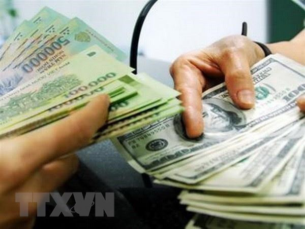 (Ảnh: TTXVN) Đồng USD tăng, áp lực tỷ giá có đáng lo ngại ở những tháng cuối năm? ảnh 3