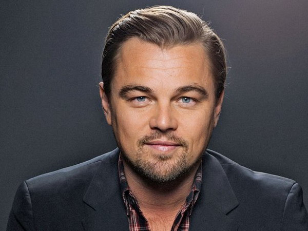Tạp chí Pháp bị kiện vì đưa tin DiCaprio làm Rihanna có thai ảnh 1