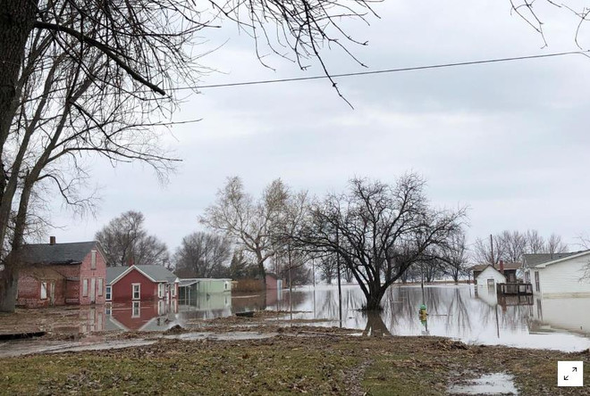 Lũ lụt làm chết nhiều người và vật nuôi ở vùng Trung Tây nước Mỹ ảnh 1
