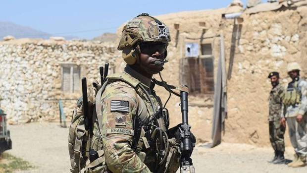 Binh sỹ Mỹ ở Afghanistan. (Nguồn: AP) Lầu Năm Góc: Mỹ có thể giảm tốc độ rút quân khỏi Afghanistan ảnh 1