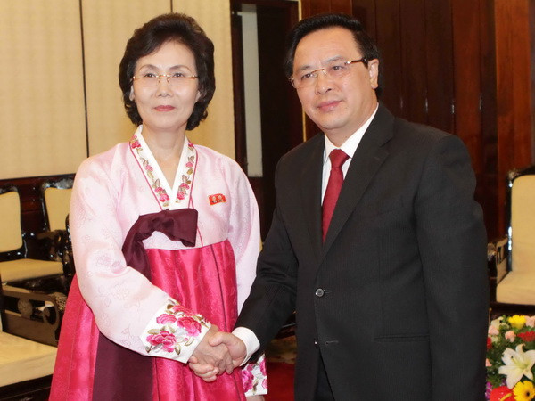 Ông Hoàng Bình Quân tiếp đoàn đại biểu Hội Phụ nữ Dân chủ Triều Tiên ảnh 1