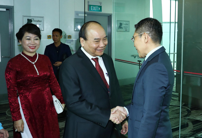 Thủ tướng Nguyễn Xuân Phúc đến Singapore dự Hội nghị Cấp cao ASEAN ảnh 1