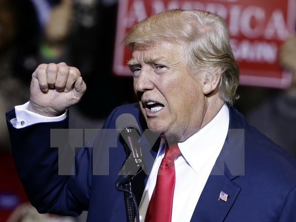 Tổng thống đắc cử Mỹ Donald Trump. (Nguồn: AP/TTXVN) Ông Trump muốn tránh xung đột lợi ích trong nhiệm kỳ lãnh đạo ảnh 1