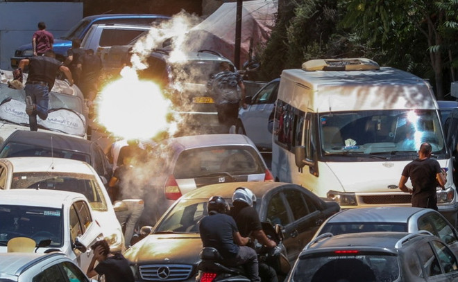 Đụng độ giữa người biểu tình Palestine và binh lính Israel ảnh 1