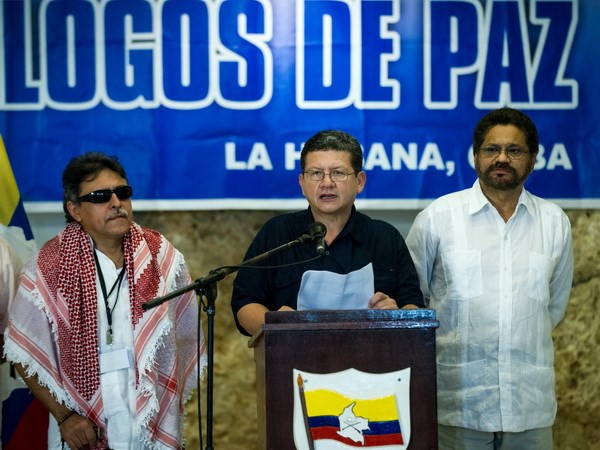 Đại diện FARC phát biểu tại Havana ngày 8/12. Ảnh minh họa. (Nguồn: AFP/TTXVN) Colombia: Phiến quân ngừng bắn dịp bầu cử tổng thống ảnh 1
