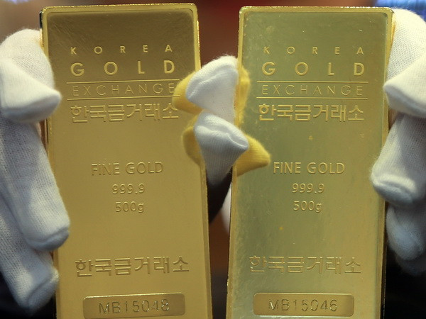 Nhà đầu tư châu Á tìm đến vàng để tránh "bão" chứng khoán ảnh 1