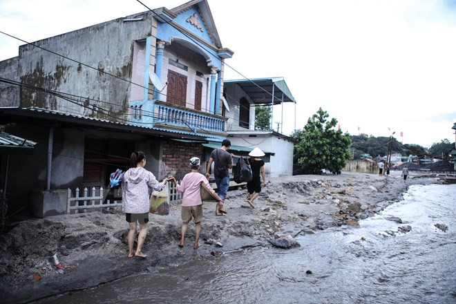 Phường Mông Dương, thành phố Cẩm Phả tan nát sau cơn lũ bùn khủng khiếp. (Ảnh: Minh Sơn/Vietnam+) Quảng Ninh bị thiệt hại 2.700 tỷ đồng sau đợt mưa lũ lịch sử ảnh 1