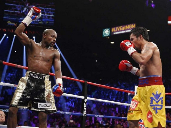 Trận "so găng thế kỷ" Mayweather-Pacquiao đạt doanh thu khổng lồ ảnh 1