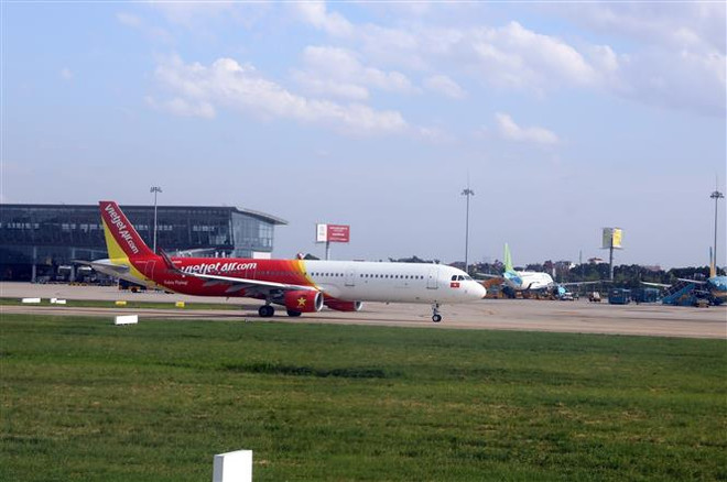 Đưa hơn 240 công dân Việt Nam từ Singapore về nước ảnh 1